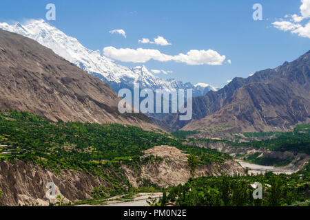 Karimabad, Hunza Valley, Gilgit-Baltistan, Pakistan : Rakaposhi mountain and Hunza Valley in the Karakoram range. At 7,788 m (25,551 ft) Rakaposhi is  Stock Photo