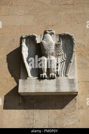 tempelhof Airfield, Berlin, Germany: 15th August 2018: Eagle carving on display in Eagle Square on the former airfield terminal Stock Photo