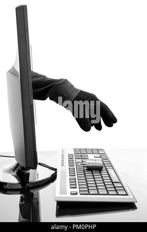 Hacker's gloved hand stealing padlock through a computer screen. Concept of internet security. Stock Photo