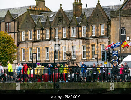 Leith, Edinburgh, Scotland, UK, 16th September 2018. Edinburgh Kilt Walk, sponsored by the Royal Bank of Scotland, takes place today. Walkers raise funds for a charity of their choice. The kilt walkers reach The Shore in Leith at about Mile 14. Walkers cross the bridge Stock Photo