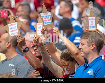 Maryland, USA. 16th Sep, 2018. Fans hold up signs as the National Anthem is played prior to the game pitting Indianapolis Colts against the Washington Redskins at FedEx Field in Landover, Maryland on Sunday, September 16, 2018. Credit: Ron Sachs/CNP | usage worldwide Credit: dpa picture alliance/Alamy Live News Stock Photo