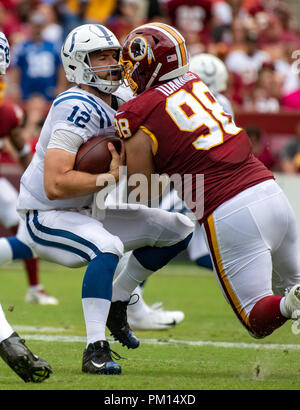 Maryland, USA. 16th Sep, 2018. Indianapolis Colts quarterback Andrew Luck (12) is sacked by Washington Redskins defensive tackle Matthew Ioannidis (98) in the second quarter at FedEx Field in Landover, Maryland on Sunday, September 16, 2018. Credit: Ron Sachs/CNP | usage worldwide Credit: dpa picture alliance/Alamy Live News Stock Photo