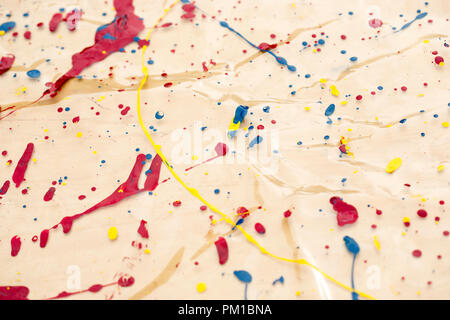 Background splattered with colourful paint Stock Photo