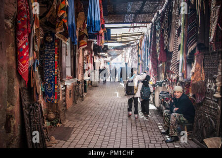 26-02-15, Marrakech, Morocco. School children walk to school through an uncrowded section of the Medina. Photo © Simon Grosset Stock Photo