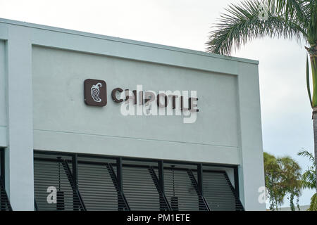 MIAMI, USA - AUGUST 22, 2018: Chipotle restaurant logo. Chipotle Mexican Grill is an American chain of fast casual restaurants Stock Photo