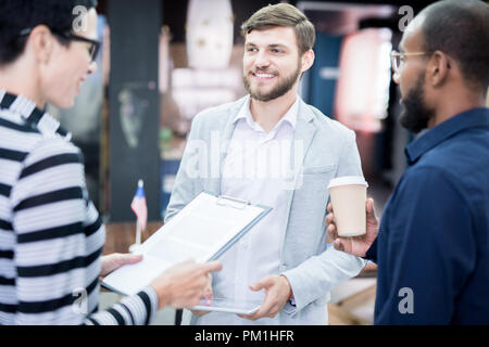 Business partners preparing for conference Stock Photo