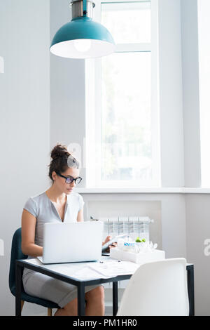 Successful Businesswoman Working in Cafe Stock Photo