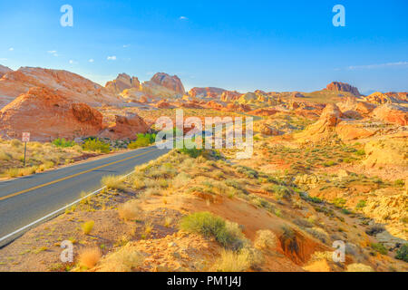 The scenic drive White Domes Road crosses Valley of Fire State Park to become the colorful Rainbow Vista Road. Valley of Fire is located in Mojave Desert, 58 miles of Las Vegas, Nevada, Unites States. Stock Photo