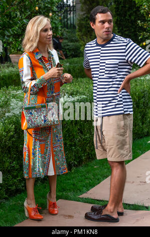 Stylist Tory Burch and Chief Executive of LVMH Fashion Group Pierre-Yves  Roussel attending the Amfar dinner as part of Paris Fashion Week at the  Peninsula Hotel in Paris, France on July 03