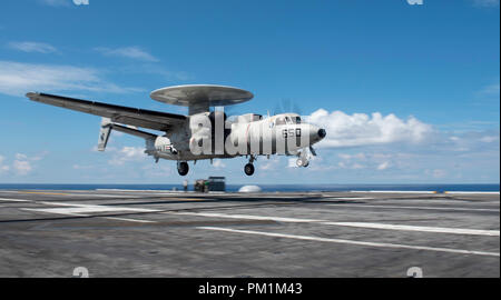 180913-N-FA806-0108 ATLANTIC OCEAN (Sept. 13, 2018) An E-2C Hawkeye assigned to Carrier Airborne Early Warning Squadron (VAW) 124 lands aboard the aircraft carrier USS George H.W. Bush (CVN 77). GHWB, with embarked Carrier Strike Group (CSG) 10 staff, is underway in the Atlantic Ocean due to Sortie Condition Alpha, which ordered all ships to depart Hampton Roads in response to Hurricane Florence. CSG-10 is the Sortie Commander. (U.S. Navy photo by Mass Communication Specialist 3rd Class Roland John) Stock Photo