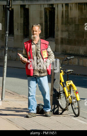 Big Issue vendor Stock Photo