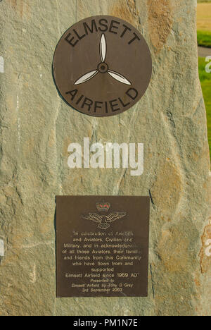 Standing stone memorial commemoration at Elmsett Airfield in celebration of aviation and aviators, civilian and military, families and friends. Plaque Stock Photo