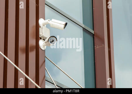 CCTV cameras on the wall of the building Stock Photo