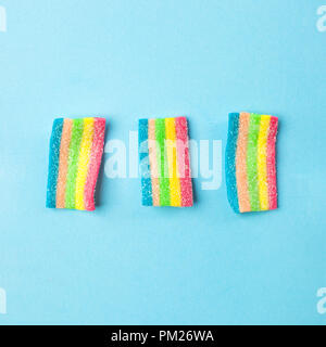 candies with jelly and sugar pattern. colorful array of different childs sweets and treats. Bright party background Stock Photo