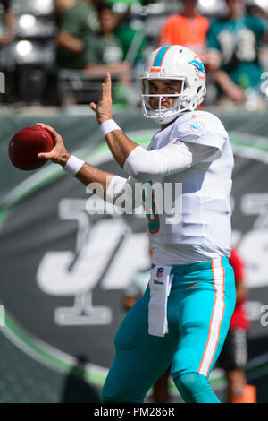 East Rutherford, NJ, USA. 16th Sep, 2018. Miami Dolphins quarterback Brock Osweiler (8) warms up prior to the game between The New York Jets and The Miami Dolphins at Met Life Stadium in East Rutherford, NJ. Mandatory Credit: Kostas Lymperopoulos/CSM/Alamy Live News Stock Photo