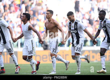 Turin, Italy. 16th Sep, 2018. FC Juventus' Cristiano Ronaldo (C) celebrates with teammates after the Serie A soccer match between FC Juventus and Sassuolo in Turin, Italy, Sept. 16, 2018. FC Juventus won 2-1. Credit: Alberto Lingria/Xinhua/Alamy Live News Stock Photo