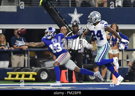 Arlington, Texas, USA. September 16, 2018: New York Giants wide receiver Odell  Beckham Jr. (13) tries to get around Dallas Cowboys cornerback Byron Jones  (31) during the first half of the NFL