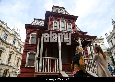 Royal Academy of Arts. London. UK 17 Sept 2018 - Transitional Object (Psychobarn) a 30 feet (10m), made from the components of a dismantled traditional American red barn and based on the house seen in Alfred Hitchcock’s film Psycho (1960) on display at the Royal Academy of Arts’ courtyard from 18 September 2018 – March 2019.  Credit: Dinendra Haria/Alamy Live News Stock Photo