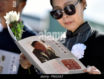 Beijing, China. 17th Sep, 2018. A mourner attends the farewell ceremony of performing artist Zhu Xu (1930-2018) at the Babaoshan Funeral Parlour in Beijing, capital of China, Sept. 17, 2018. Credit: Li He/Xinhua/Alamy Live News Stock Photo