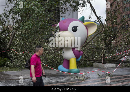 Hong Kong, New Territories, China. 17th Sep, 2018. Beijing 2008 Paralympics mascot surrounded by damaged trees after super typhoon, Mangkhut has passed Hong Kong.The super typhoon Mangkhut has passed next to Hong Kong on the 16th September causing large scale damages around the city, there are 432 people injured due to the storm with 2 still in critical condition. Credit: Miguel Candela/SOPA Images/ZUMA Wire/Alamy Live News Stock Photo