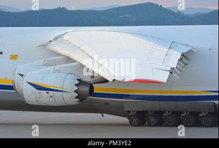 Extended flaps and slats of an Antonov 124 from Antonov Desgin Bureau including chevrons on its engines Stock Photo