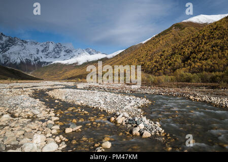 Samegrelo-zemo svaneti autumn. Enguri river and Shhara mountain, Georgia. Landscape with Main Caucasian ridge Stock Photo