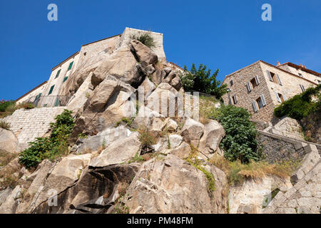 Stone houses on big rock. Old Corsican town landscape, Sartene, South Corsica island, France Stock Photo