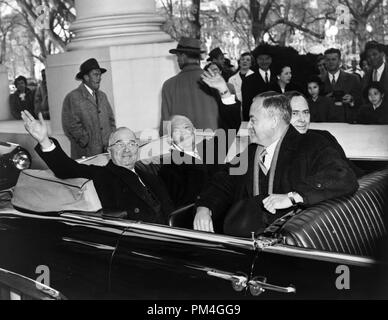 With smiles and a wave, President Harry S. Truman and his successor, Dwight D. Eisenhower, leave the White House in an open car on the way to Capitol for inauguration ceremonies, January 20, 1953.  File Reference # 1003 008THA Stock Photo