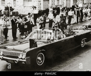 The Presidential motorcade through Dallas, Texas a few moments before President John F. Kennedy, was shot and killed, November 22, 1963. (Photo courtesy Library Of Congress)  File Reference # 1003 095THA Stock Photo