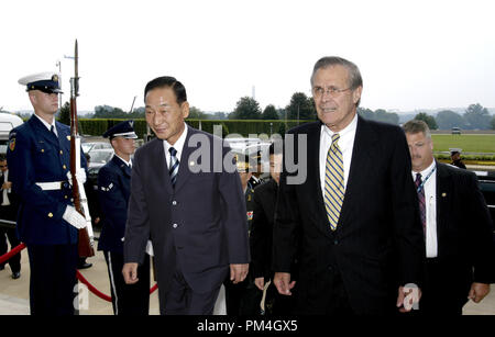 Secretary of Defense Donald H. Rumsfeld (right) escorts South Korean Minister of National Defense Cho Yong-kil into the Pentagon on the afternoon of June 27, 2003.  The two defense leaders will meet to discuss a broad range of bilateral security issues.  DoD photo by R. D. Ward.  (Released)                                 File Reference # 1003 128THA Stock Photo