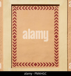 Decorative frame on house wall Stock Photo