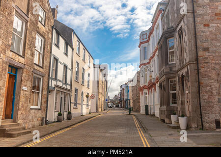 Narrow old street in Caernarfon, Wales with elegant Georgian houses. Stock Photo