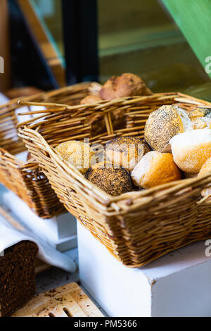 Wicker baskets of bread and bagels at brunch in a hotel in Amsterdam Stock Photo