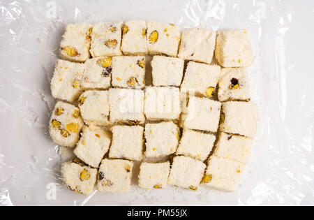 Turkish delight dessert with pistachio on white background Stock Photo