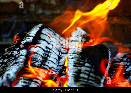 Fire Burning Brightly in Wood burning Fireplace Stock Photo