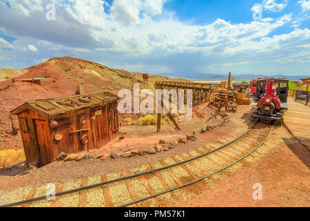 Heritage railroad in historic ghost town. Old steam train tour through old silver mines in Calico abandoned town. Calico Mountains of Mojave Desert region of Southern California, Unites States. Stock Photo