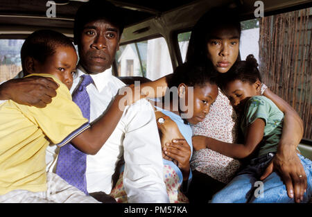 Film Still from 'Hotel Rwanda' Don Cheadle, Sophie Okonedo © 2004 United Artists Photo Credit: Frank Connor  File Reference # 30735262THA  For Editorial Use Only -  All Rights Reserved Stock Photo