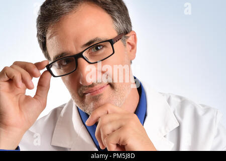 Portrait of an ophthalmologist smiling with glasses close-up. Concept of visual correction with eye glasses. Horizontal composition Stock Photo