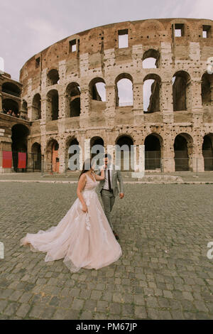 Wedding couple near Colosseum in Rome, Italy, Europe Stock Photo - Alamy