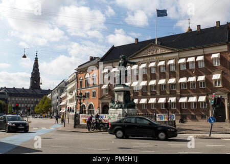 COPENHAGEN, DENMARK - SEPTEMBER 08, 2018:  Danske Bank’s corporate headquarter at Holmens Kanal  in Copenhagen (R) and the Danish Parliament (L) in Copenhagen. Danske Bank is the largest bank in Denmark. According to a Wall Street Journal article on September 07, 2018, the bank is currently investigating to which extend it has been used to launder money from companies related to Russia and is examining transactions to a value of $150 billion that flowed through its small branch in Estonia. The Danish government announced September 17, 2018,  new strong legislation to combat money laundering, w Stock Photo