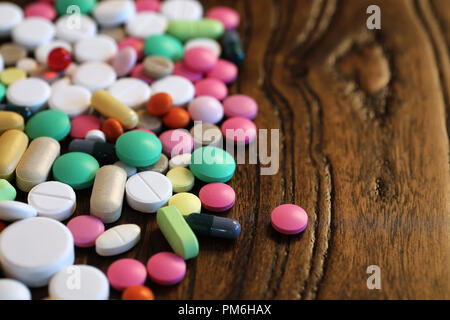 Multicolored tablets of different shapes and sizes Stock Photo