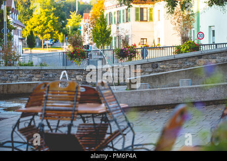 market square in a small German town, view of the empty restaurant tables on a sunny day Stock Photo