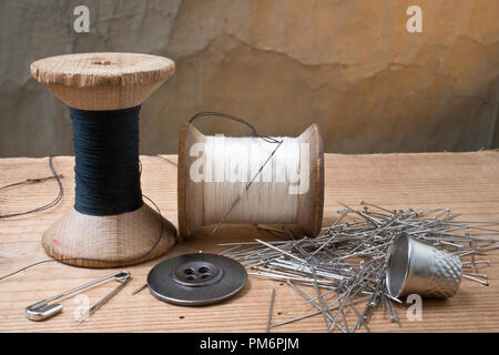 Two spools of thread with thimble Stock Photo