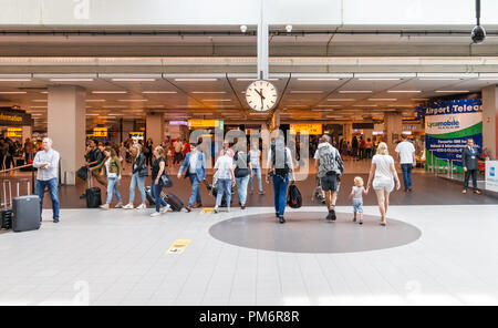 Amsterdam, Netherlands - June 01, 2018: People At Schiphol Airport Stock Photo