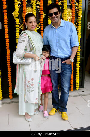 Actress Neelam Kothari arrived with husband Samir Soni and their daughter Ahana at Ekta Kapoor house for Ganpati darshan in Mumbai. Stock Photo