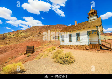 Ancient school house and chapel church in the Calico Mountains of Mojave Desert of Calico old Mining Ghost Town near Barstow in California, USA. Western Cowboy Settlement and Historic Park. Stock Photo