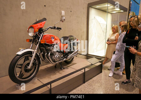 Visitors with FDNY Dream Bike display in National 9/11 Memorial & Museum.New York City.USA Stock Photo