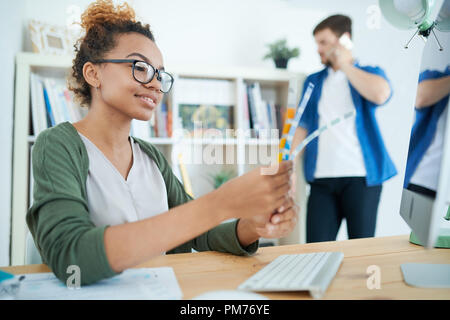 Creative African Designer at Desk Stock Photo
