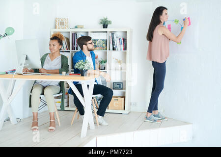 Team Working in Small Design Studio Stock Photo