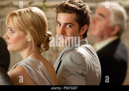 Romola Garai (left) and Jim Sturgess (center) stars as Silvie and Dexter in the romance ONE DAY Stock Photo